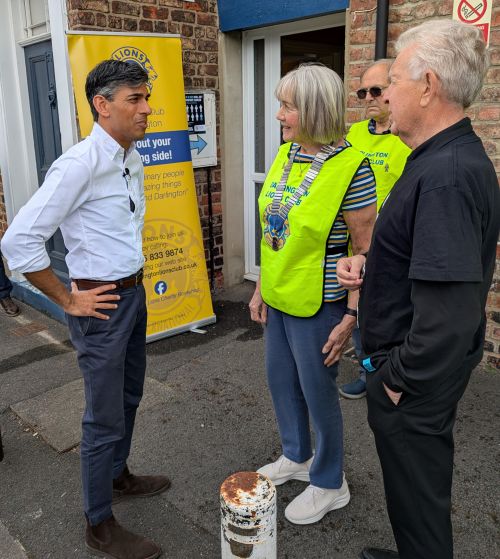 Rishi Sunak is greeted by Lions